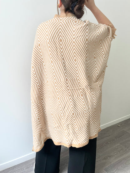 Poncho en maille beige